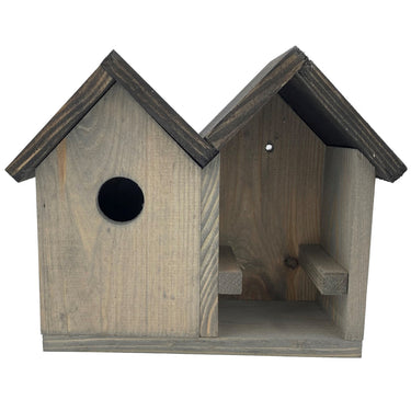 vogel huisje en een pindakaaspot houder