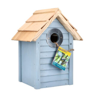 nest kast met een blauw strandhuis design